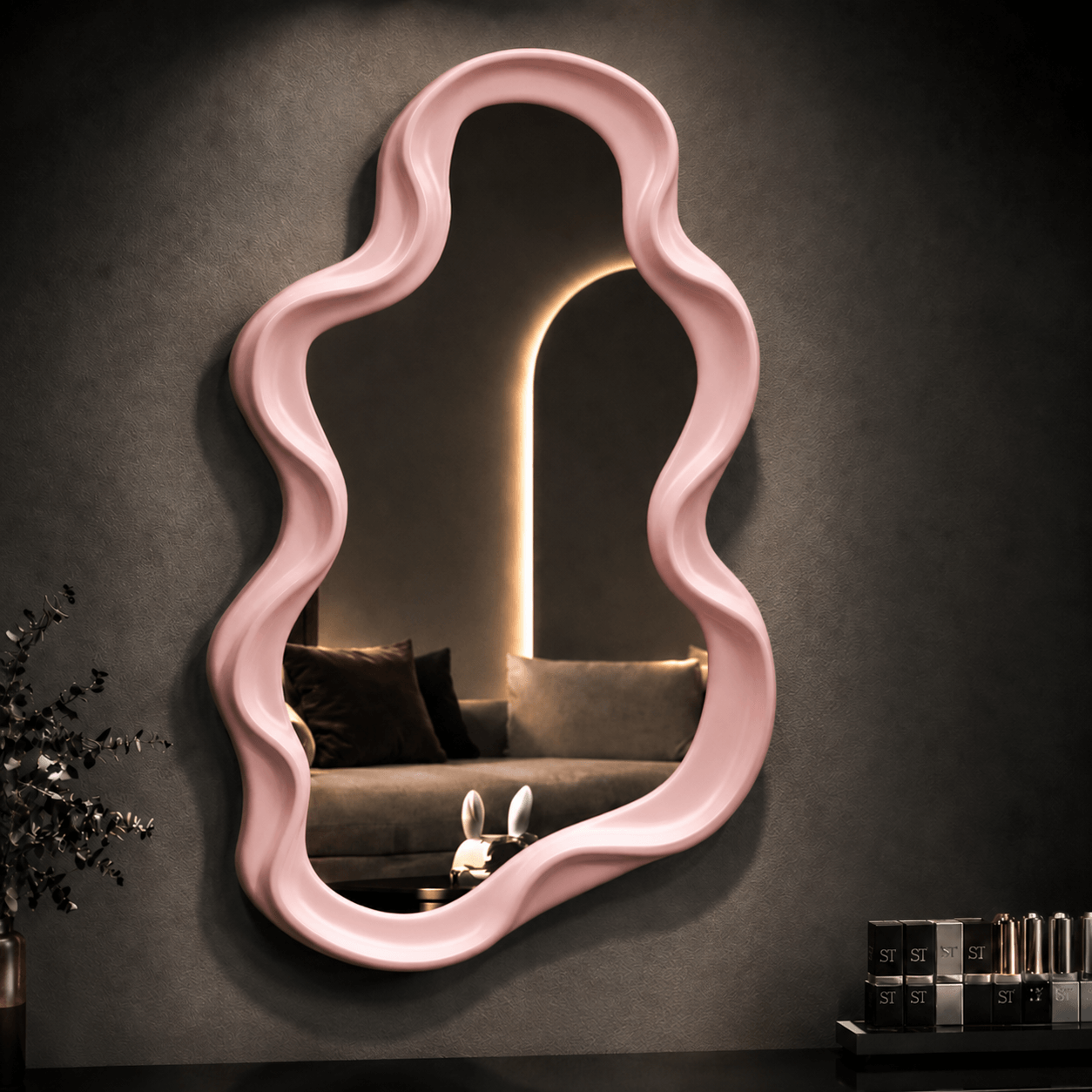 Decorative wavy wall mirror in pink, adding modern elegance to a stylish living space.